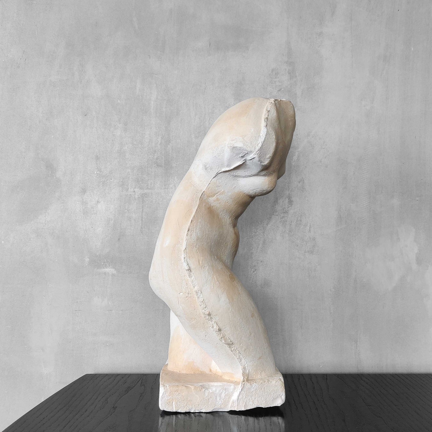A large vintage studio plaster cast sculpture study of a female torso