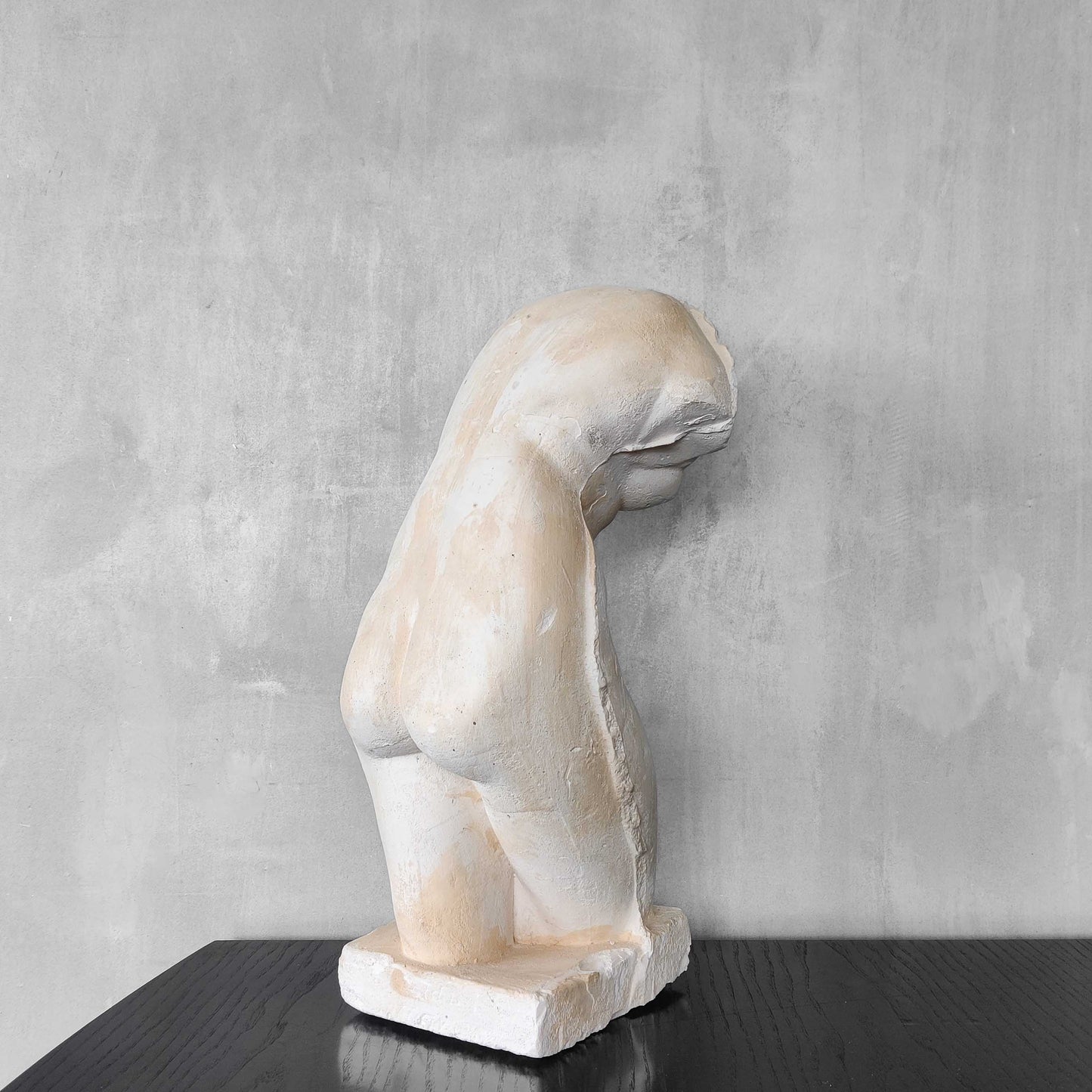 A large vintage studio plaster cast sculpture study of a female torso