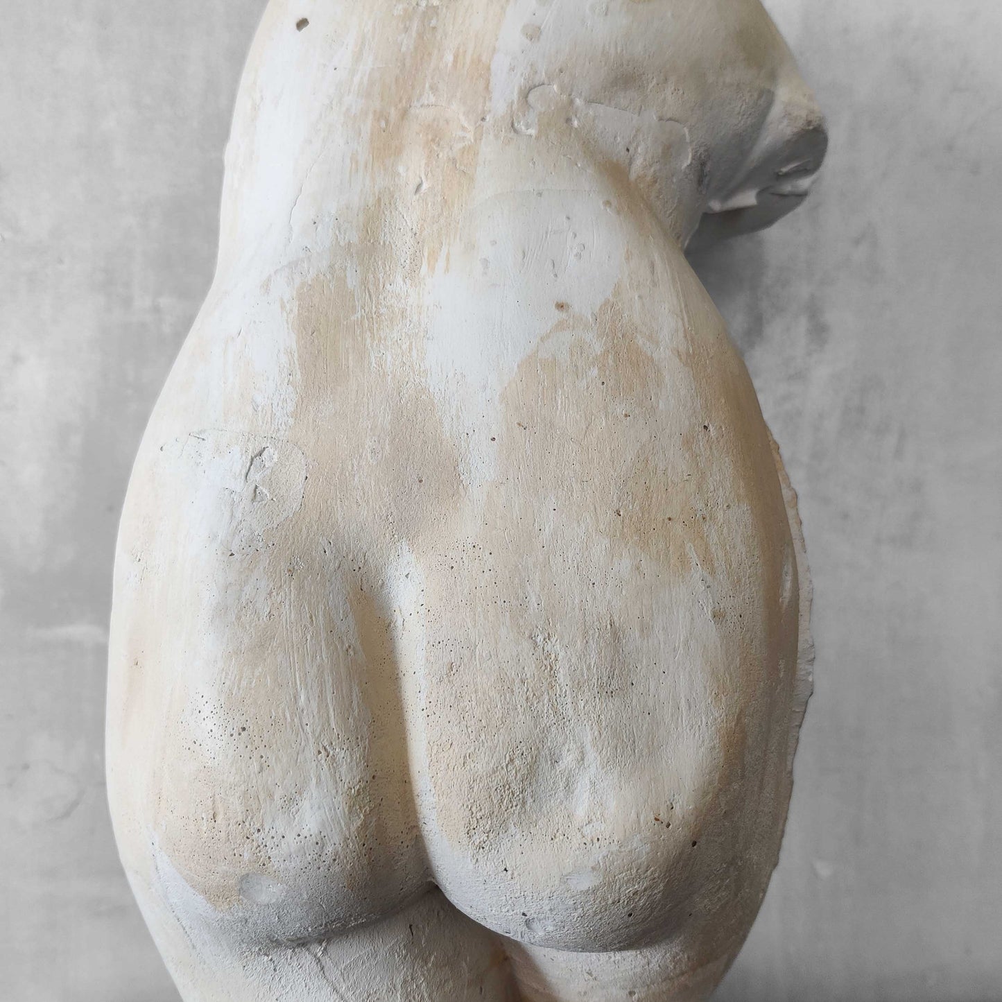 A large vintage studio plaster cast sculpture study of a female torso