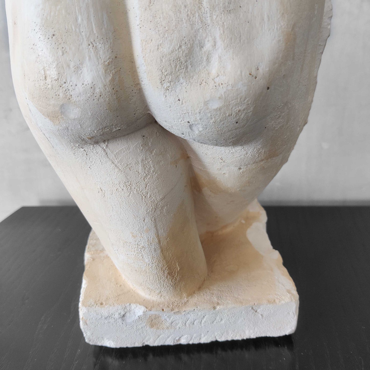 A large vintage studio plaster cast sculpture study of a female torso