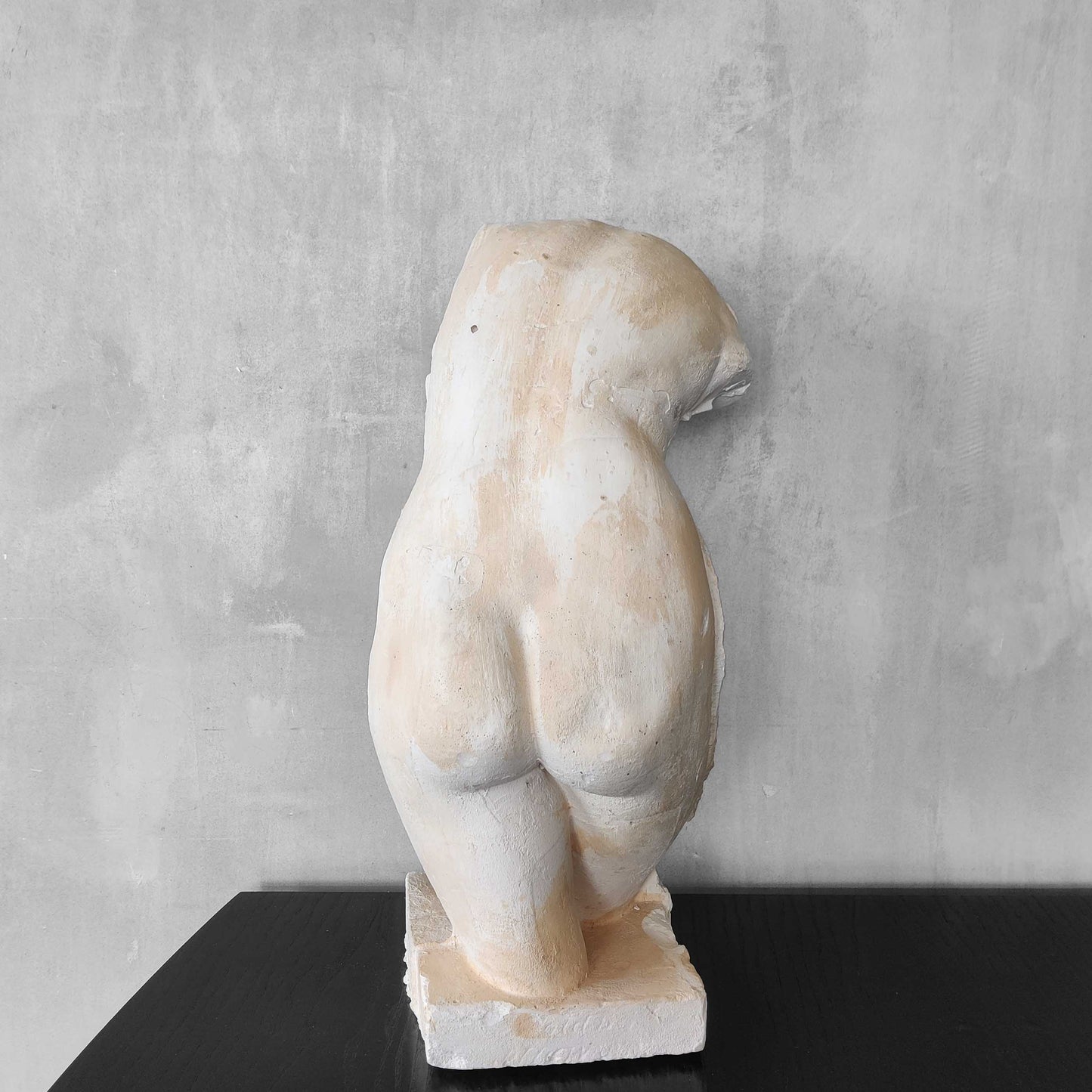 A large vintage studio plaster cast sculpture study of a female torso