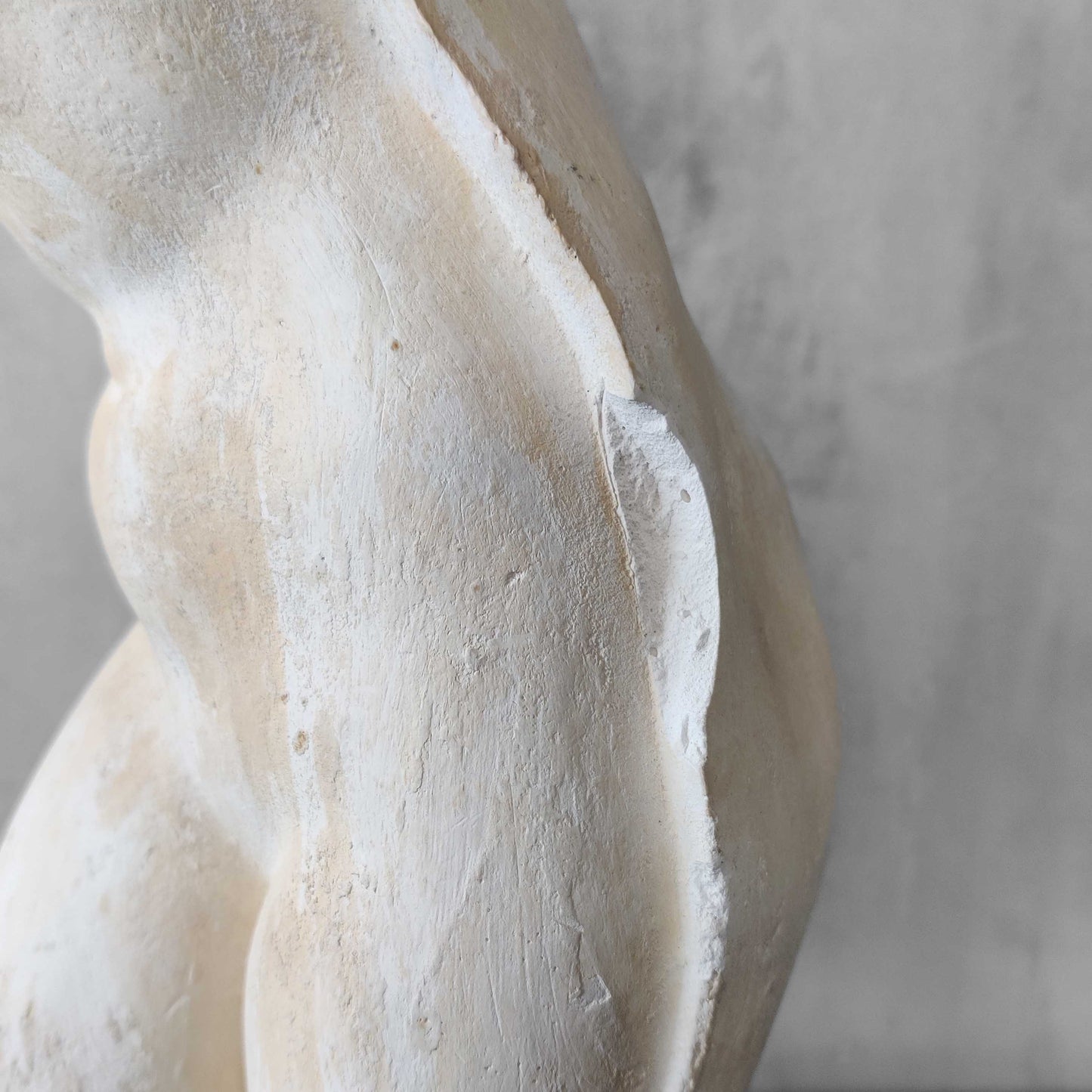 A large vintage studio plaster cast sculpture study of a female torso