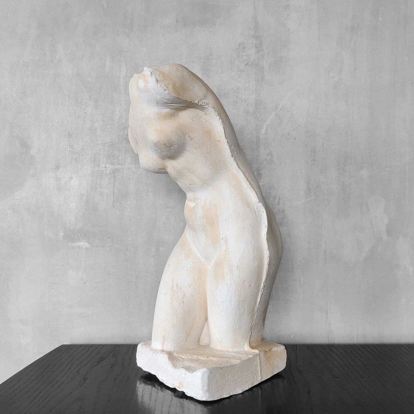 A large vintage studio plaster cast sculpture study of a female torso