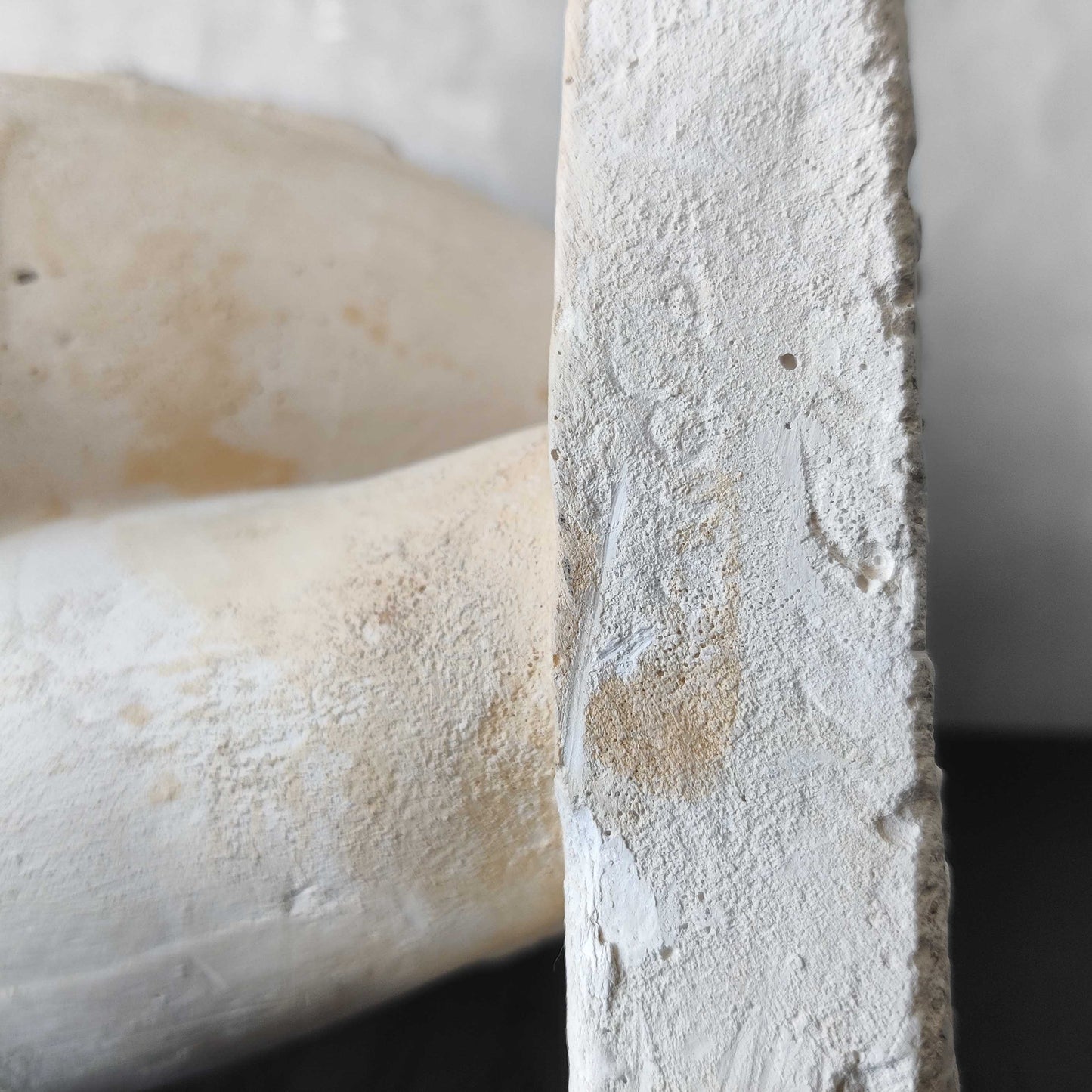 A large vintage studio plaster cast sculpture study of a female torso