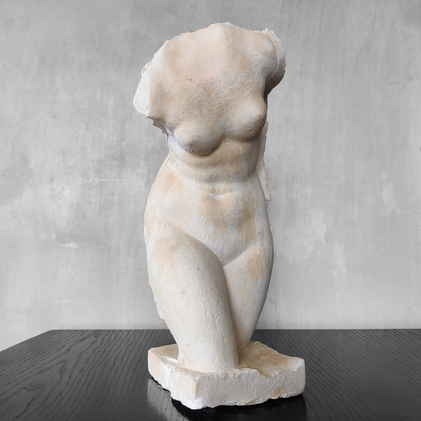 A large vintage studio plaster cast sculpture study of a female torso