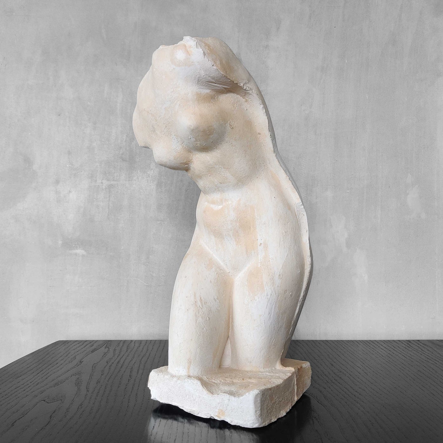 A large vintage studio plaster cast sculpture study of a female torso
