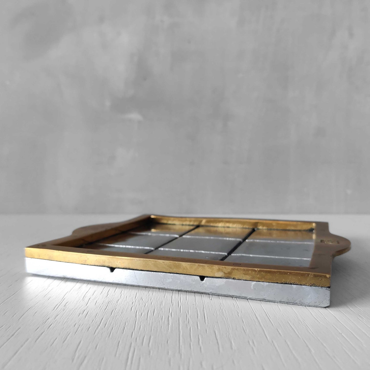 Vintage David Marshall sand cast brass and aluminium small gridded tray