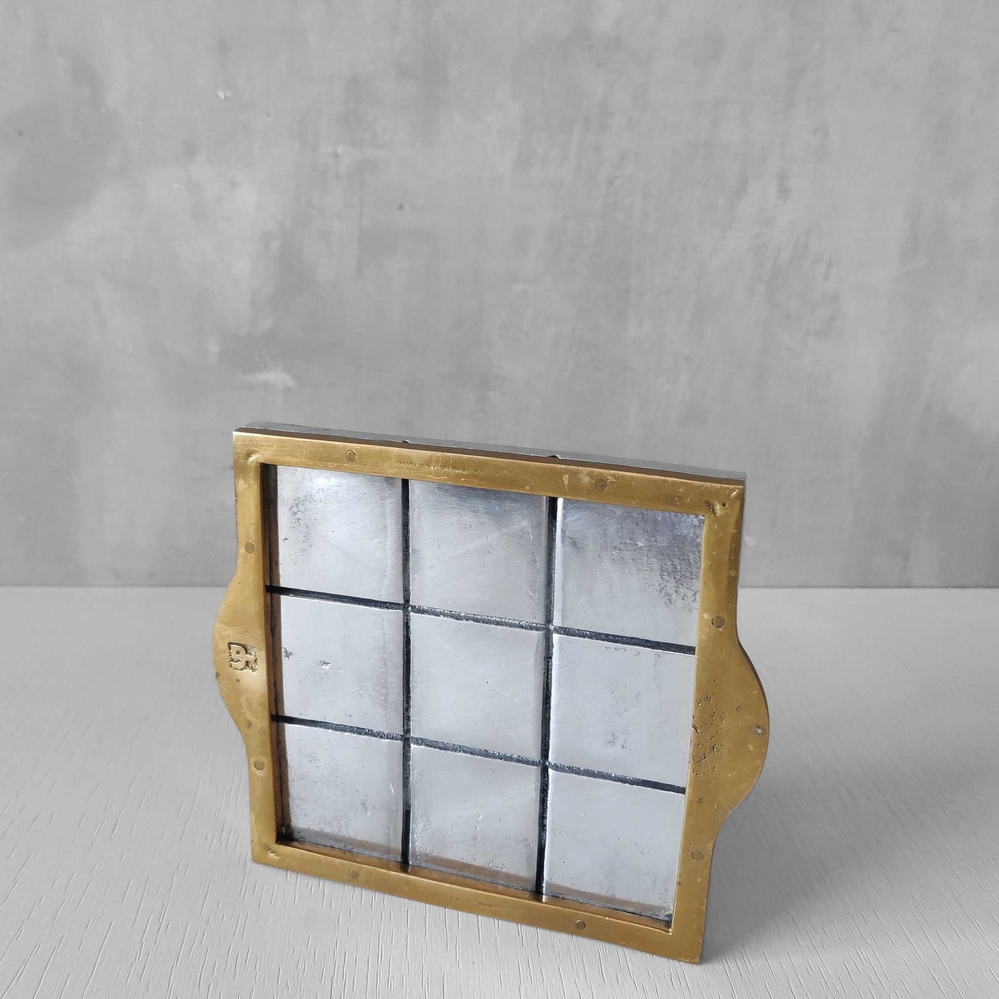 Vintage David Marshall sand cast brass and aluminium small gridded tray
