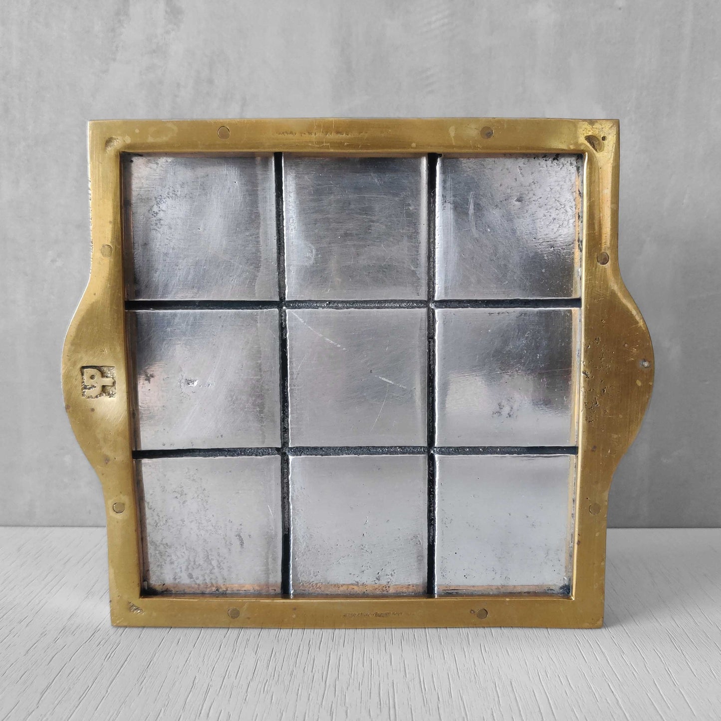 Vintage David Marshall sand cast brass and aluminium small gridded tray