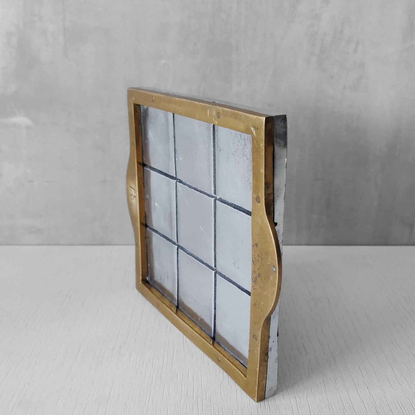 Vintage David Marshall sand cast brass and aluminium small gridded tray