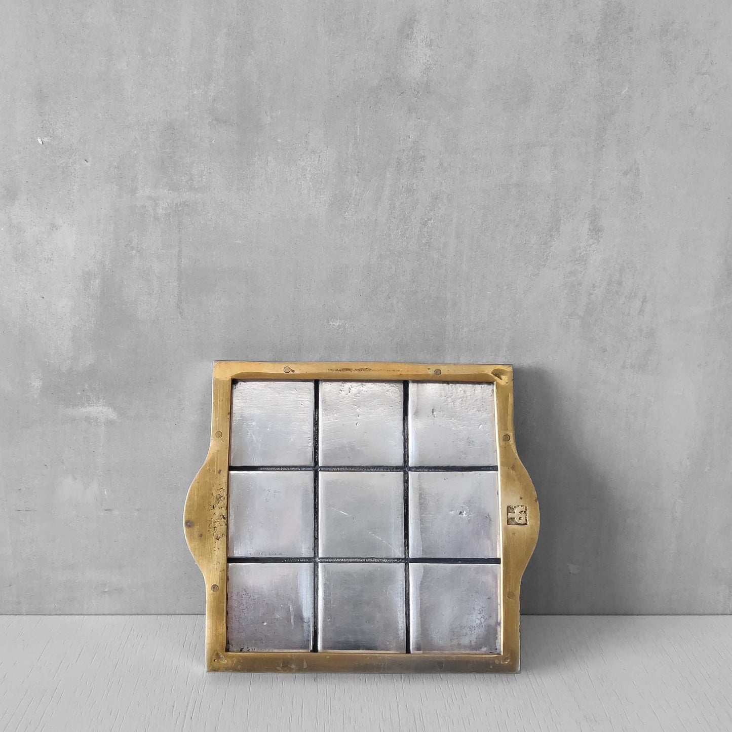 Vintage David Marshall sand cast brass and aluminium small gridded tray