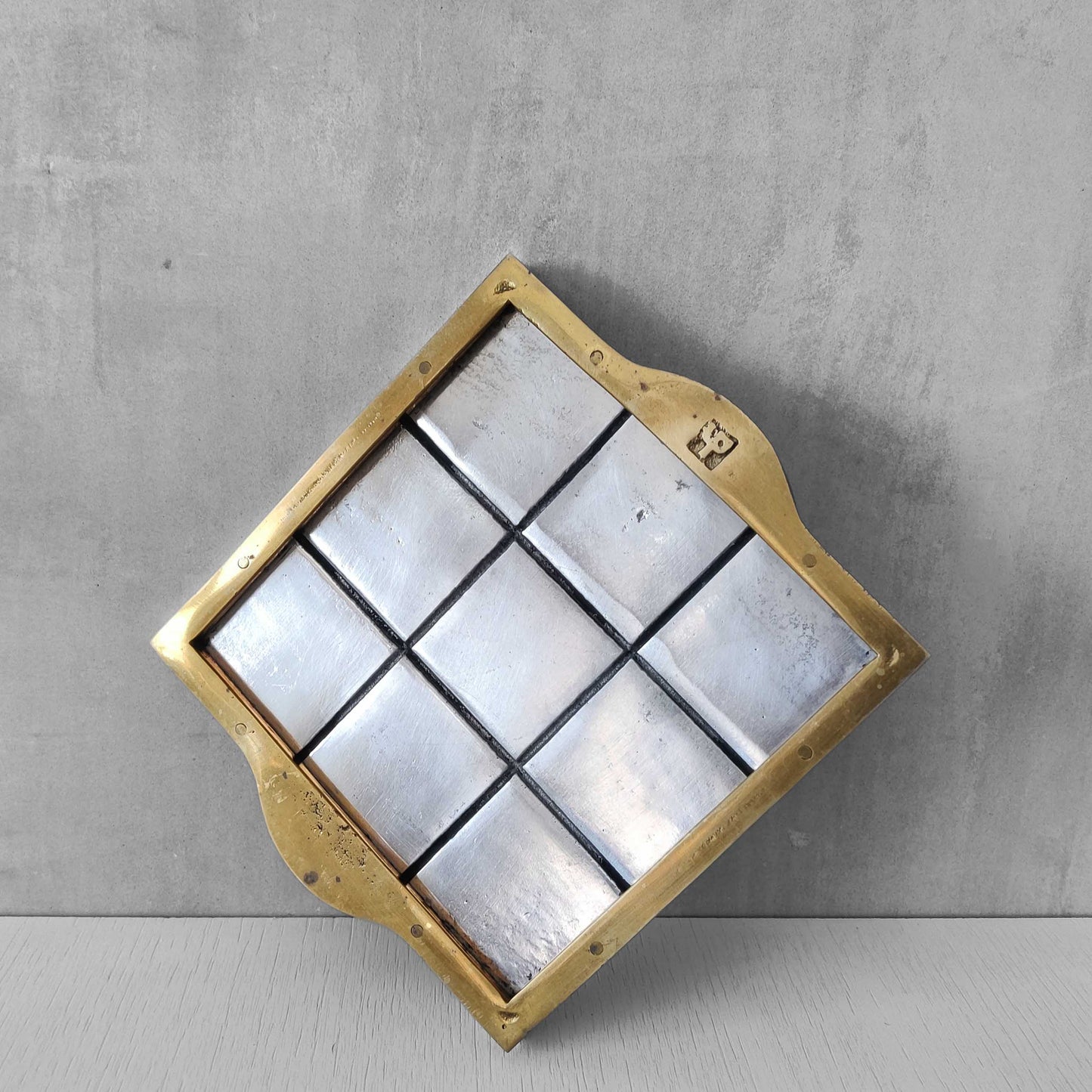 Vintage David Marshall sand cast brass and aluminium small gridded tray