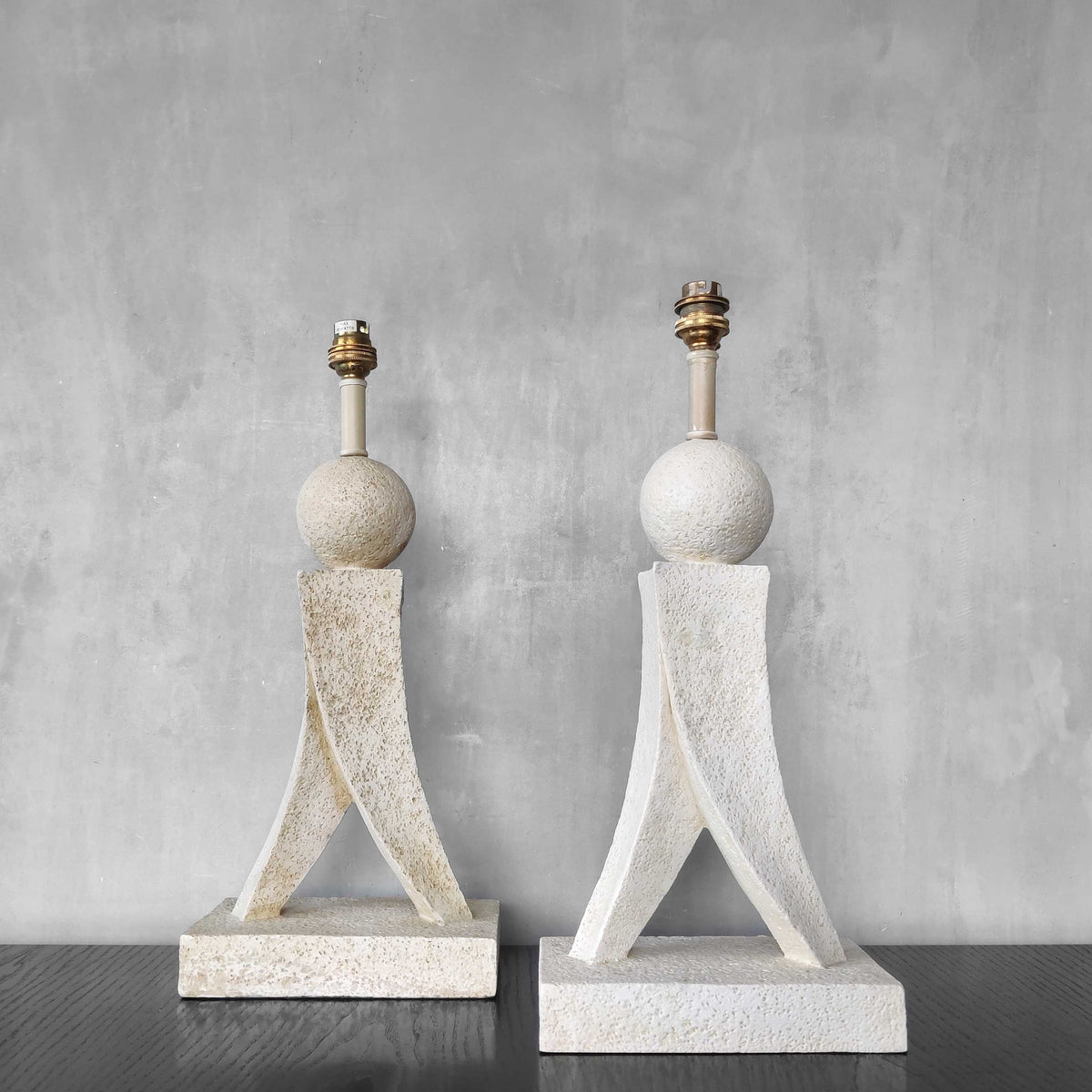 A pair of architectural sculptural postmodern table lamps