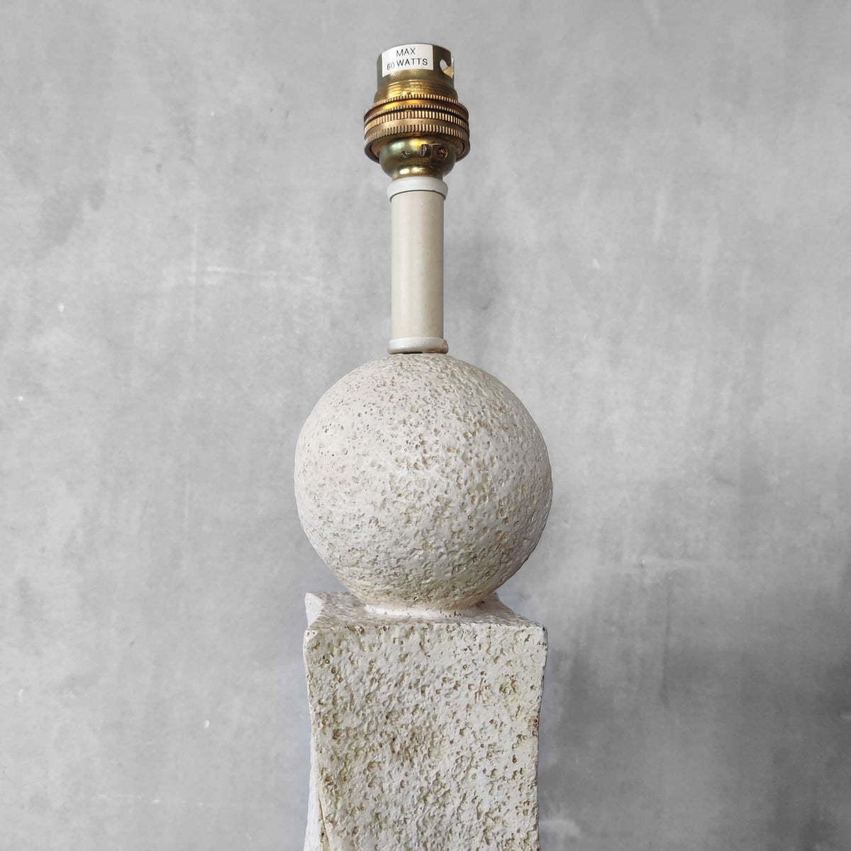A pair of architectural sculptural postmodern table lamps