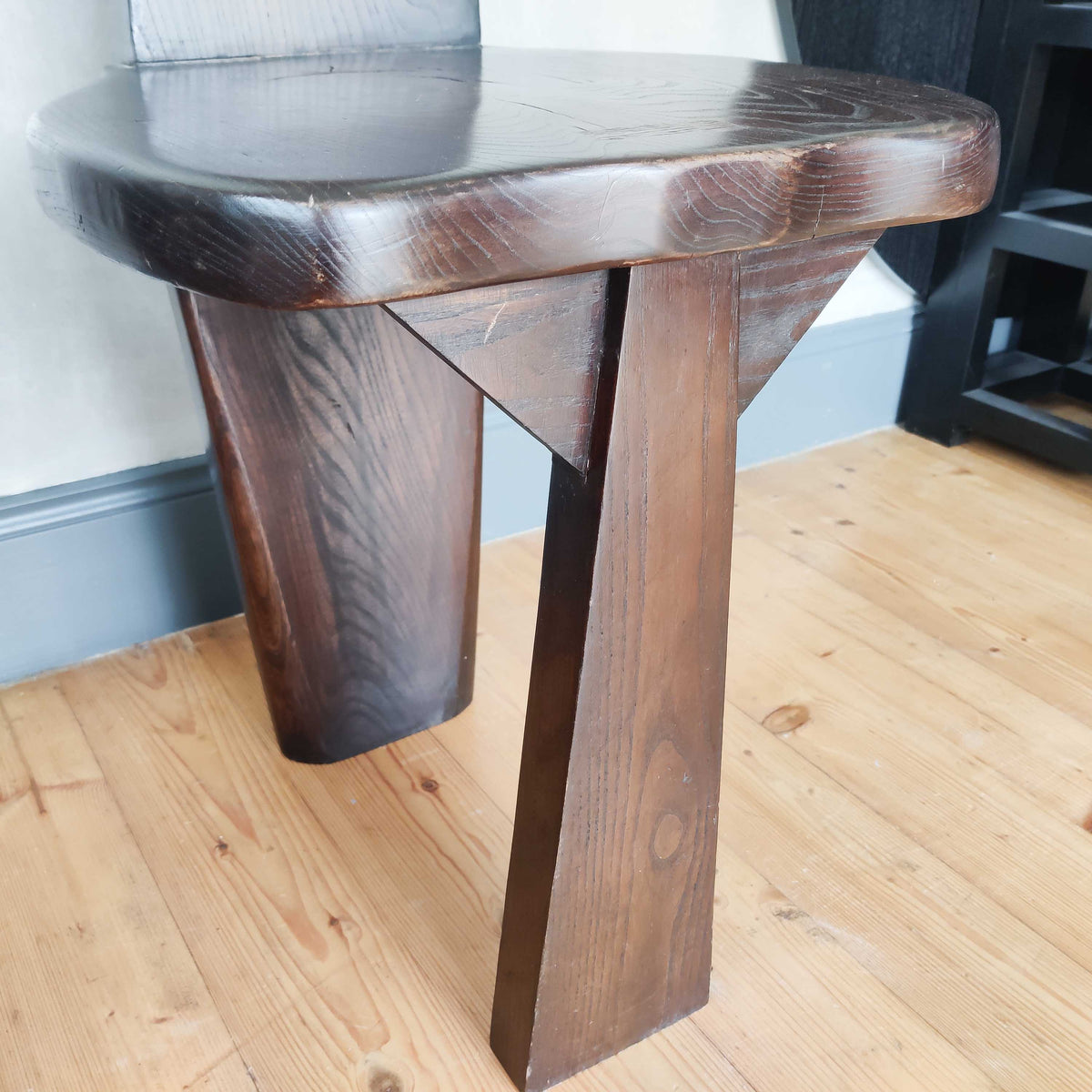 A pair of brutalist sculptural obelisk high back elm chairs