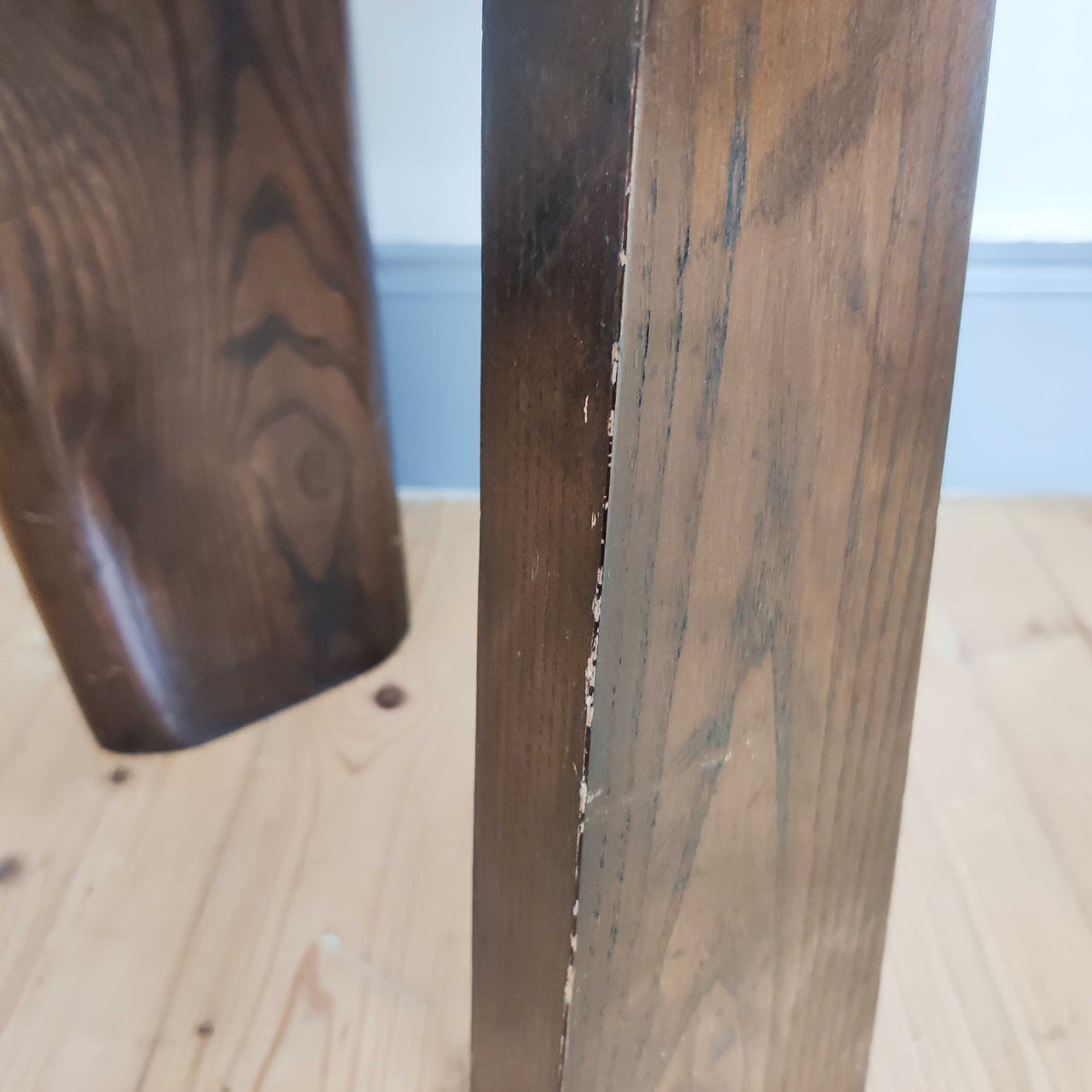 A pair of brutalist sculptural obelisk high back elm chairs