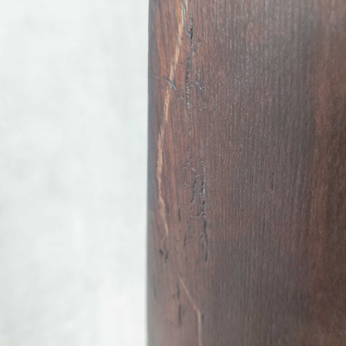 A pair of brutalist sculptural obelisk high back elm chairs
