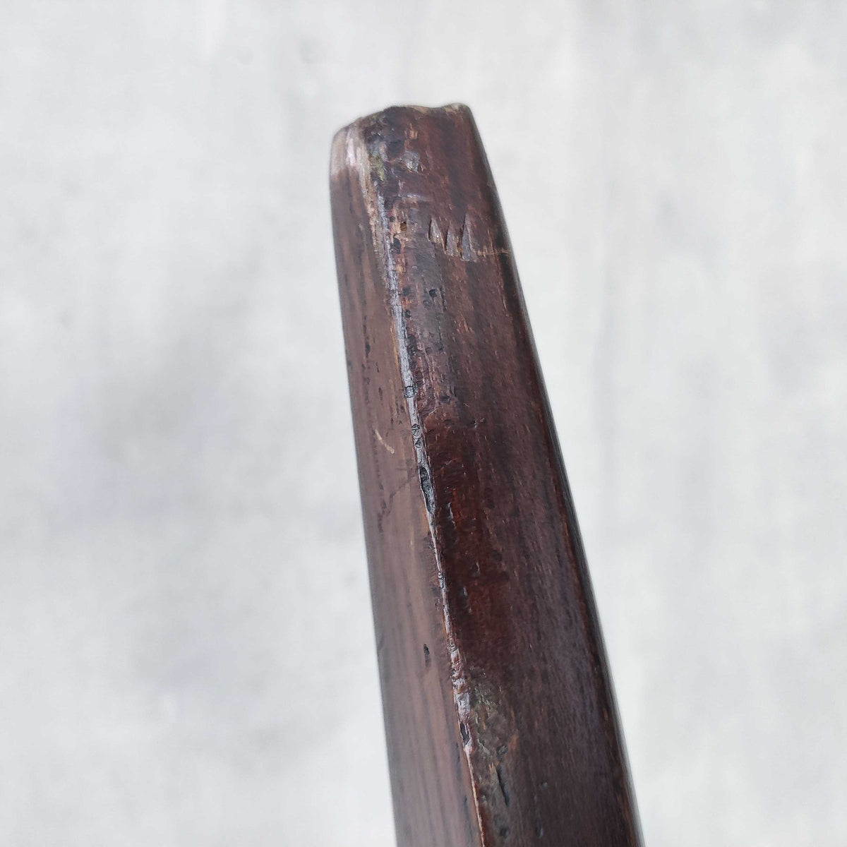 A pair of brutalist sculptural obelisk high back elm chairs