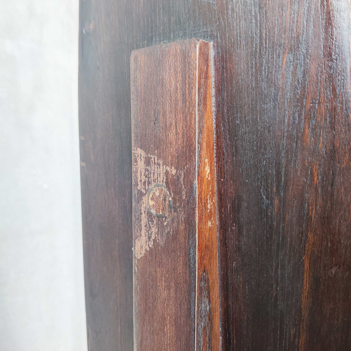 A pair of brutalist sculptural obelisk high back elm chairs