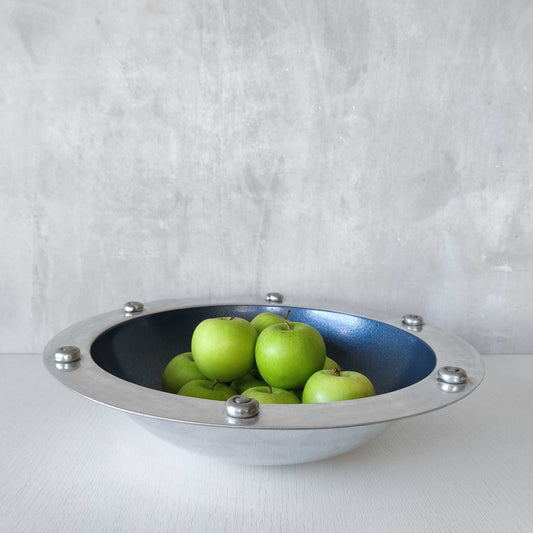 A large vintage Carrol Boyes cast aluminium centrepiece bowl with spiral rivets