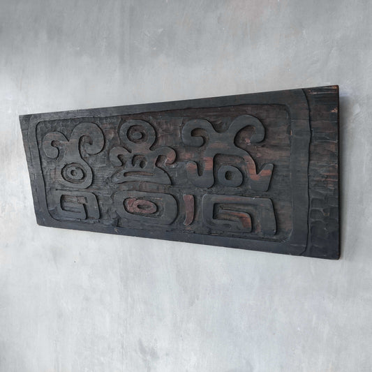 A large vintage carved folk art carved wood relief panel