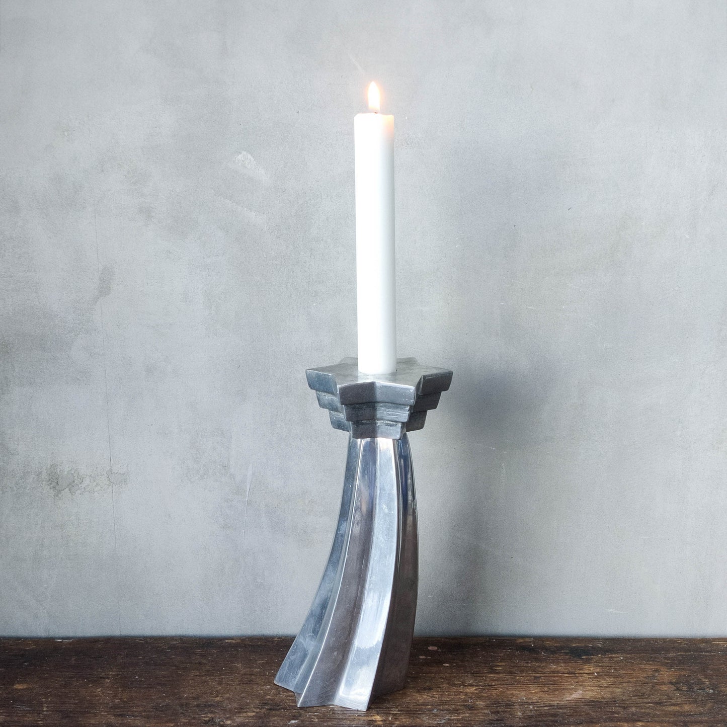 Vintage cast aluminium sculptural Deco stepped star celestial candle holder