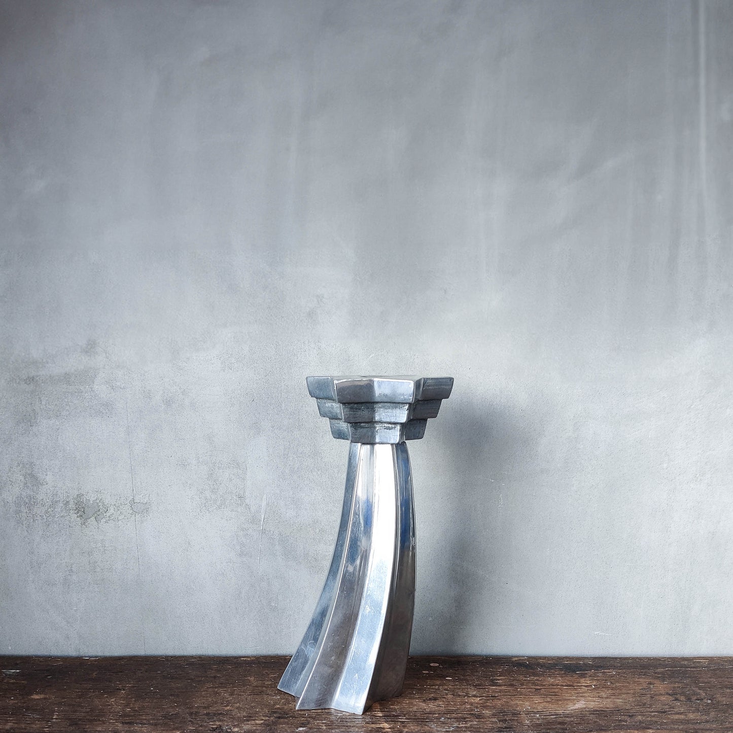 Vintage cast aluminium sculptural Deco stepped star celestial candle holder