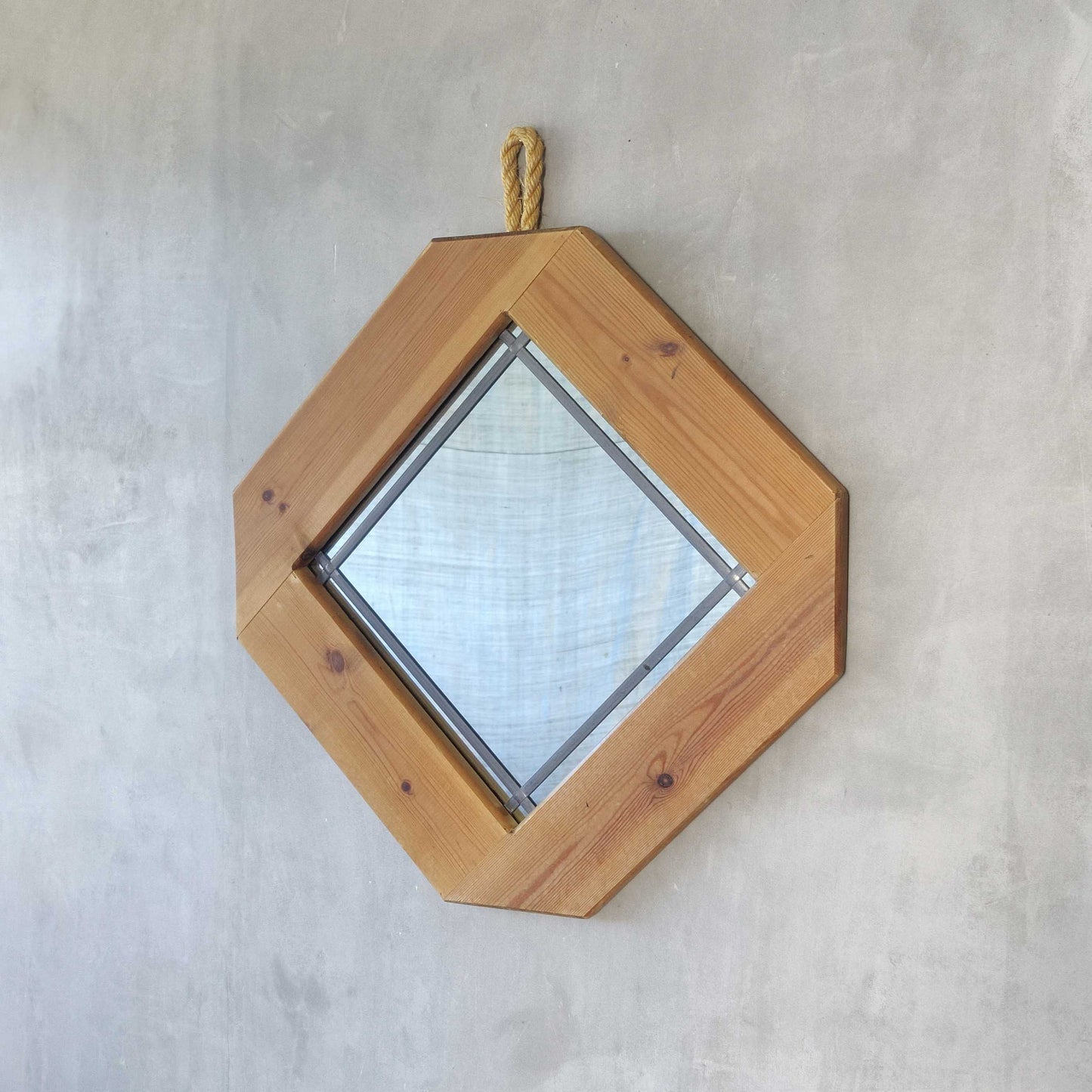 A 1990s pine framed leaded mirror with rope loop