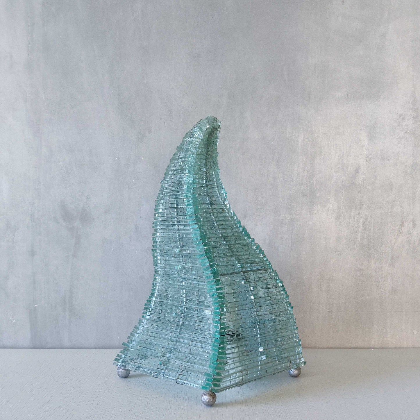 A 1970s stacked glass shard sculptural twisted pyramid lamp