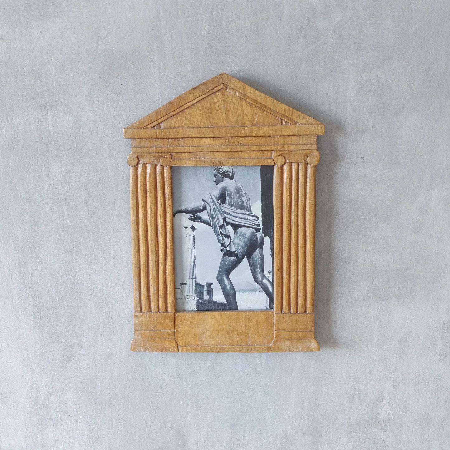 A hand carved hardwood neoclassical style photo frame