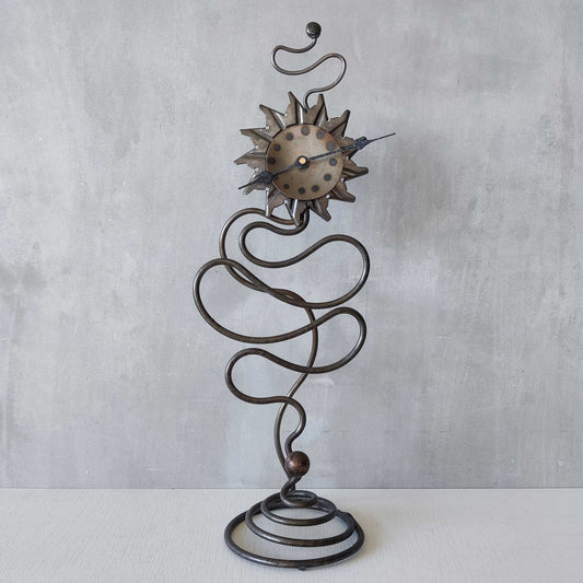 A large vintage blacksmith made forged steel abstract sculptural clock