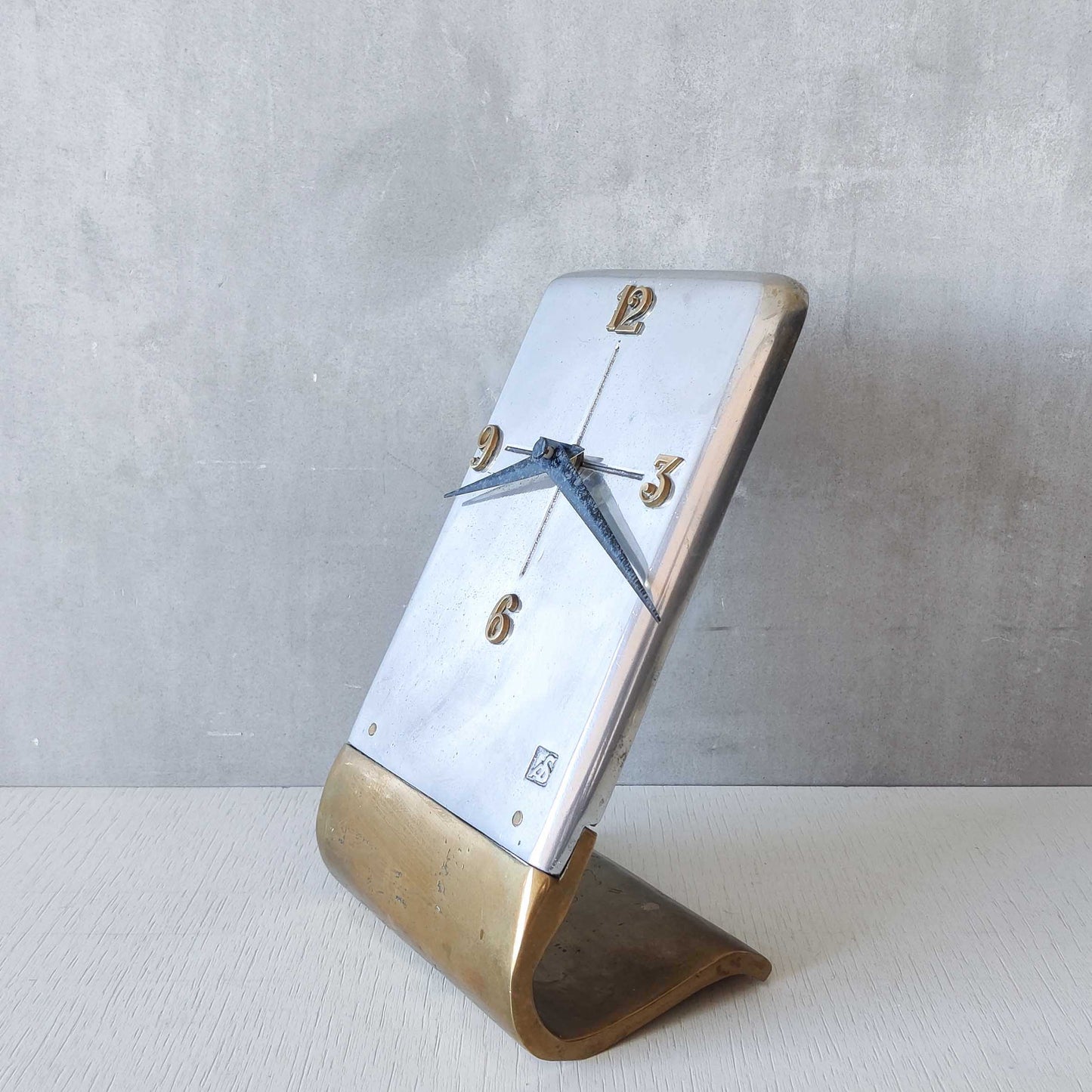 A vintage Ardisur David Marshall school brutalist cast bronze and aluminium clock