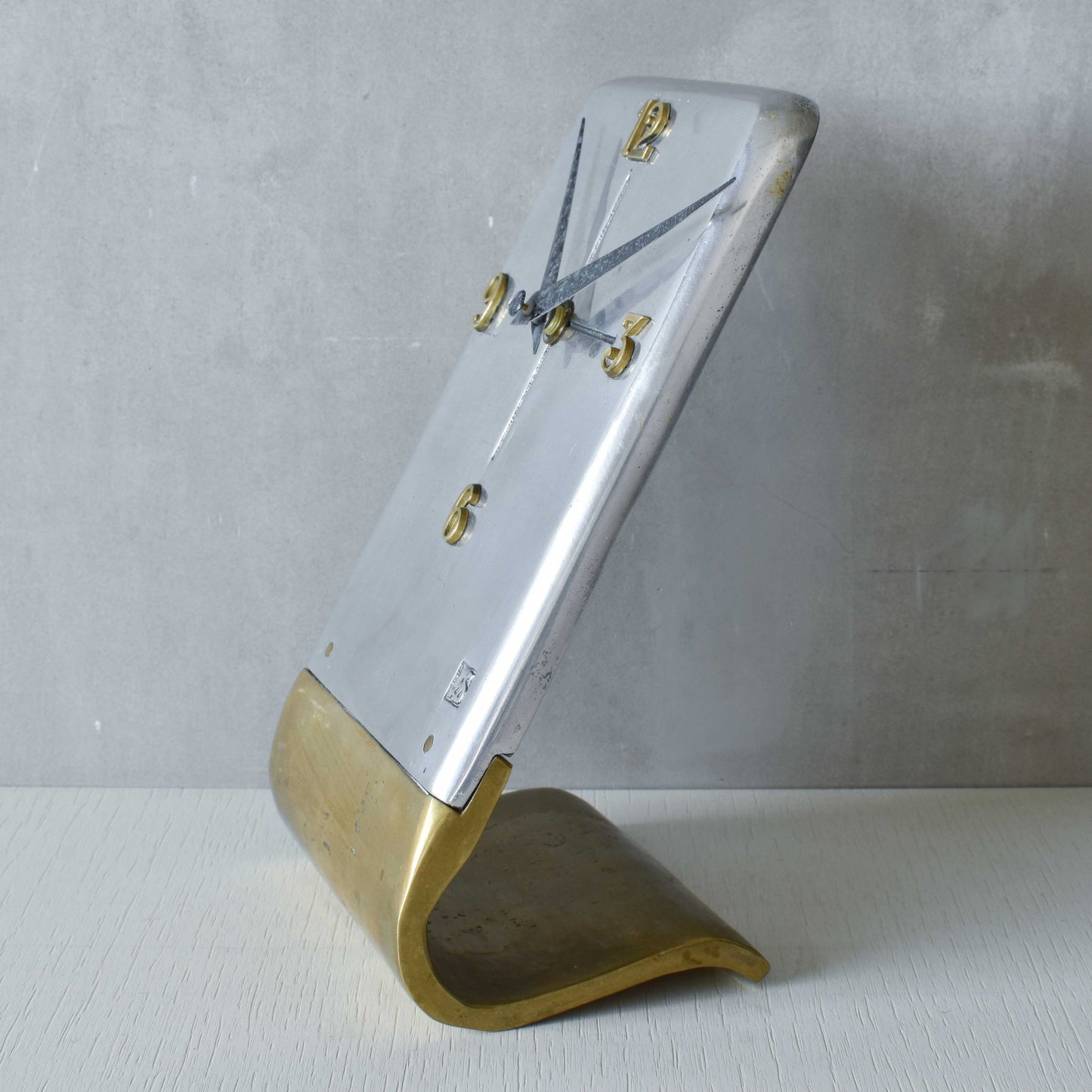 A vintage Ardisur David Marshall school brutalist cast bronze and aluminium clock