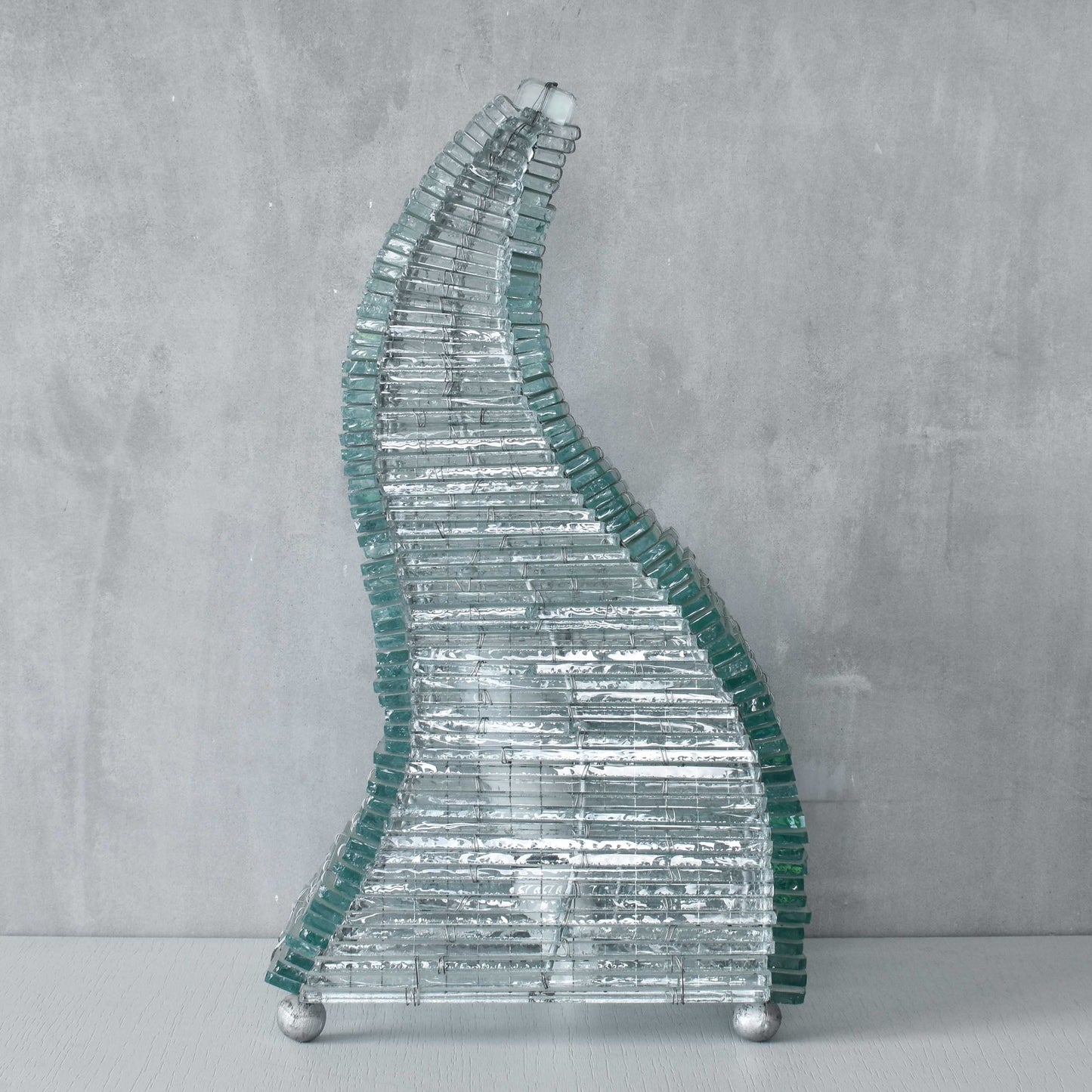 A 1970s stacked glass shard sculptural twisted pyramid lamp
