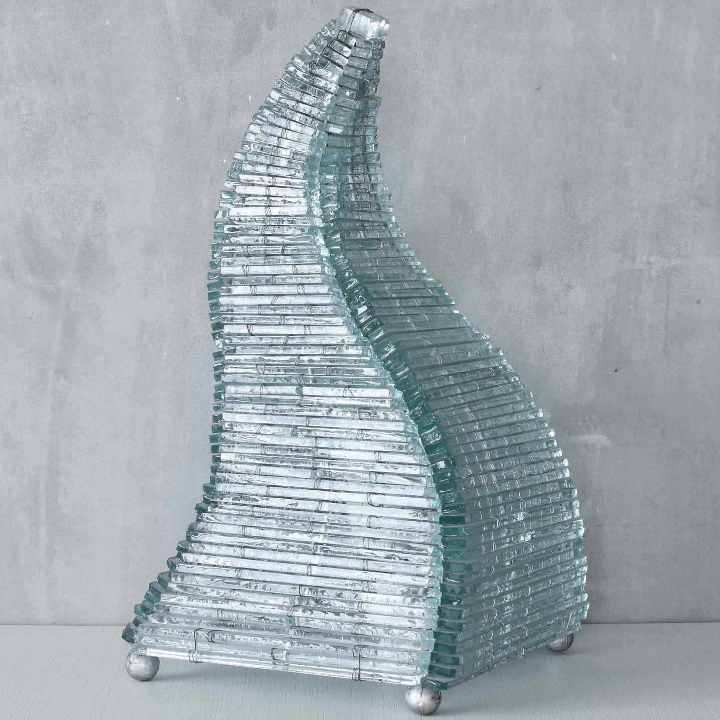 A 1970s stacked glass shard sculptural twisted pyramid lamp