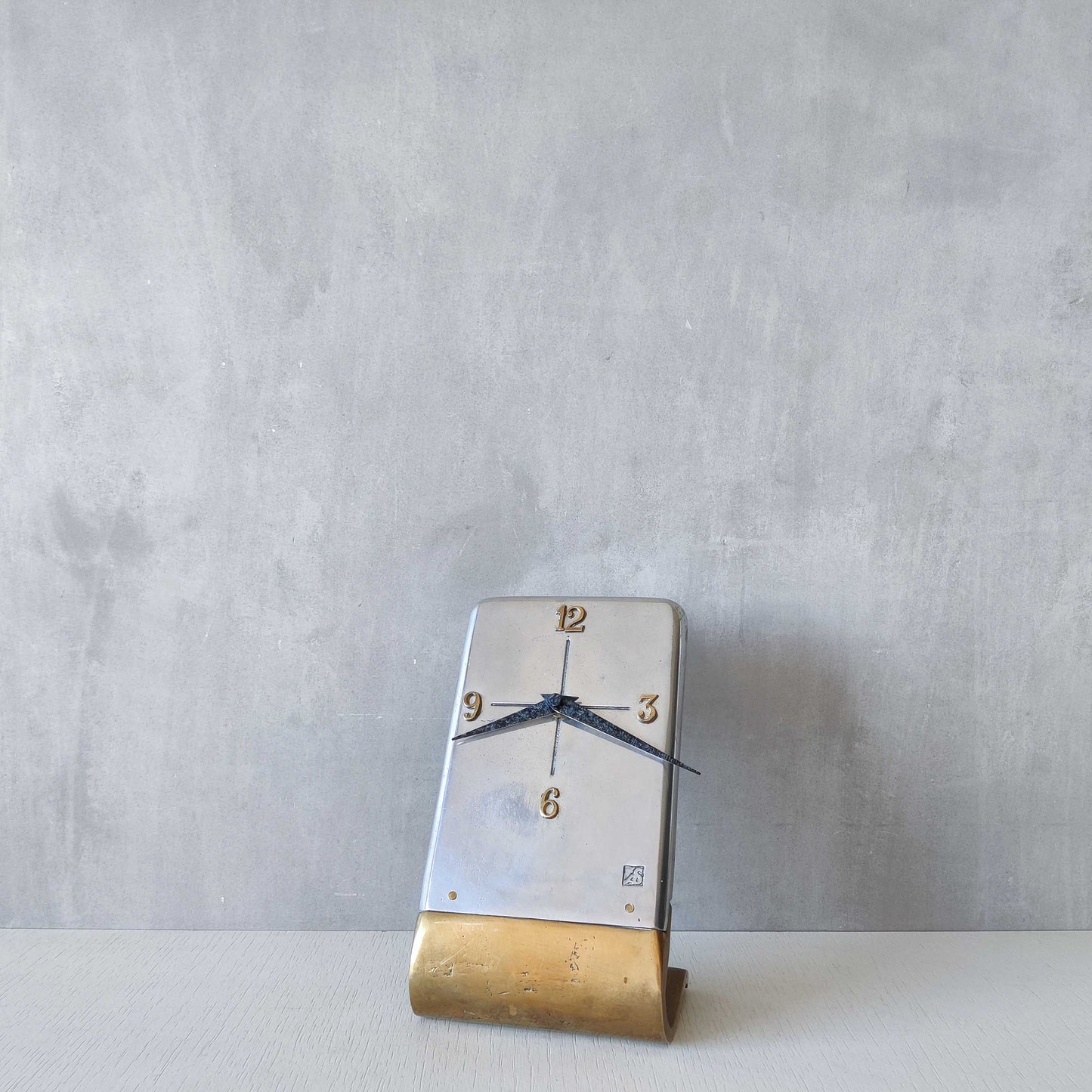 A vintage Ardisur David Marshall school brutalist cast bronze and aluminium clock