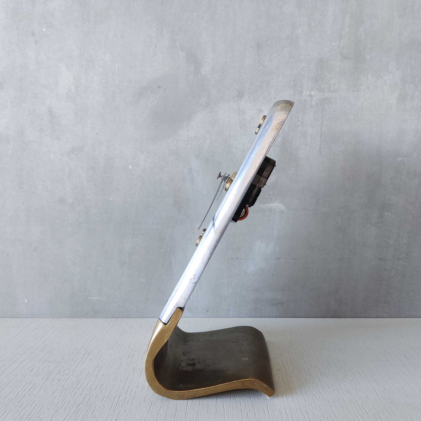 A vintage Ardisur David Marshall school brutalist cast bronze and aluminium clock