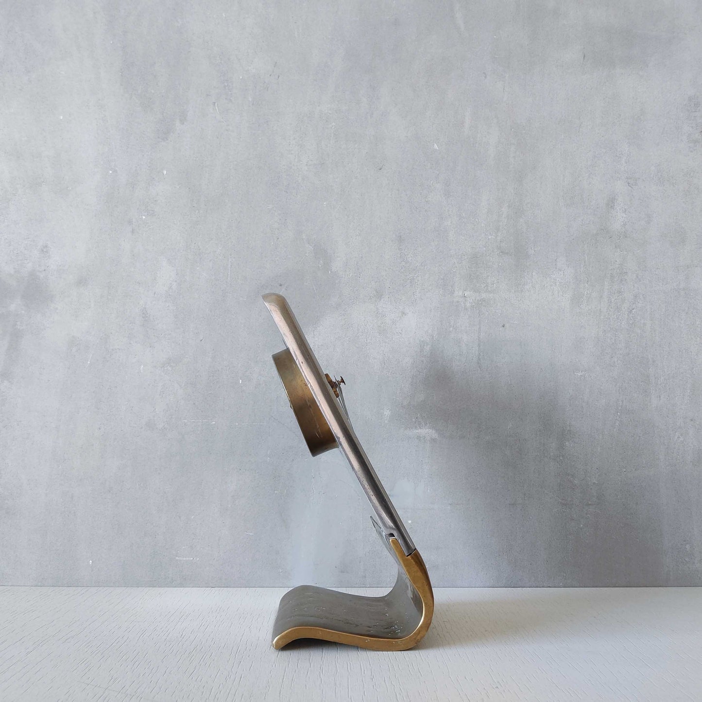 A vintage Ardisur David Marshall school brutalist cast bronze and aluminium clock