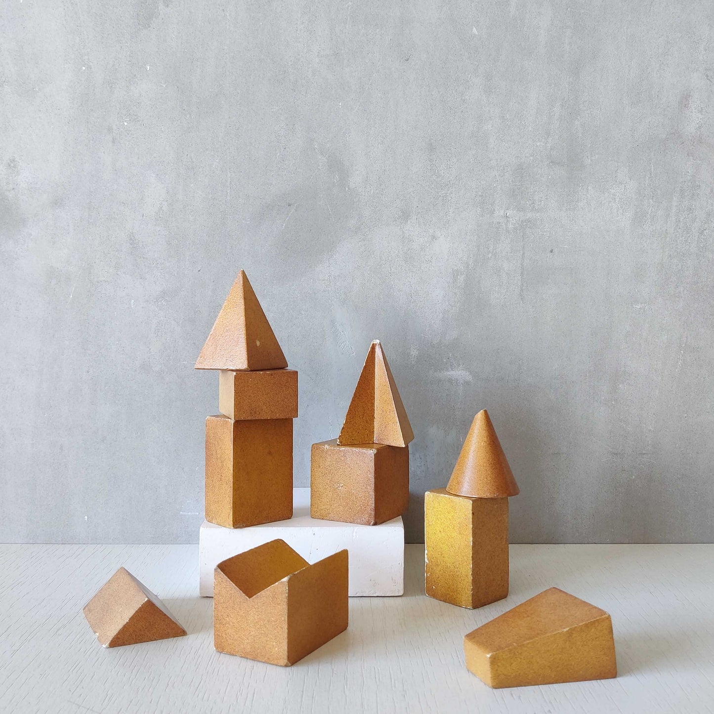 A set of 10 painted cast plaster 1950s geometric solids architectural models