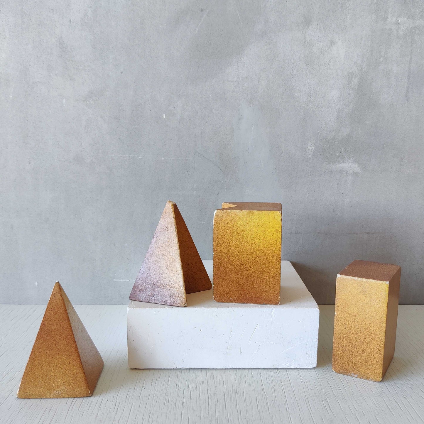 A set of 10 painted cast plaster 1950s geometric solids architectural models