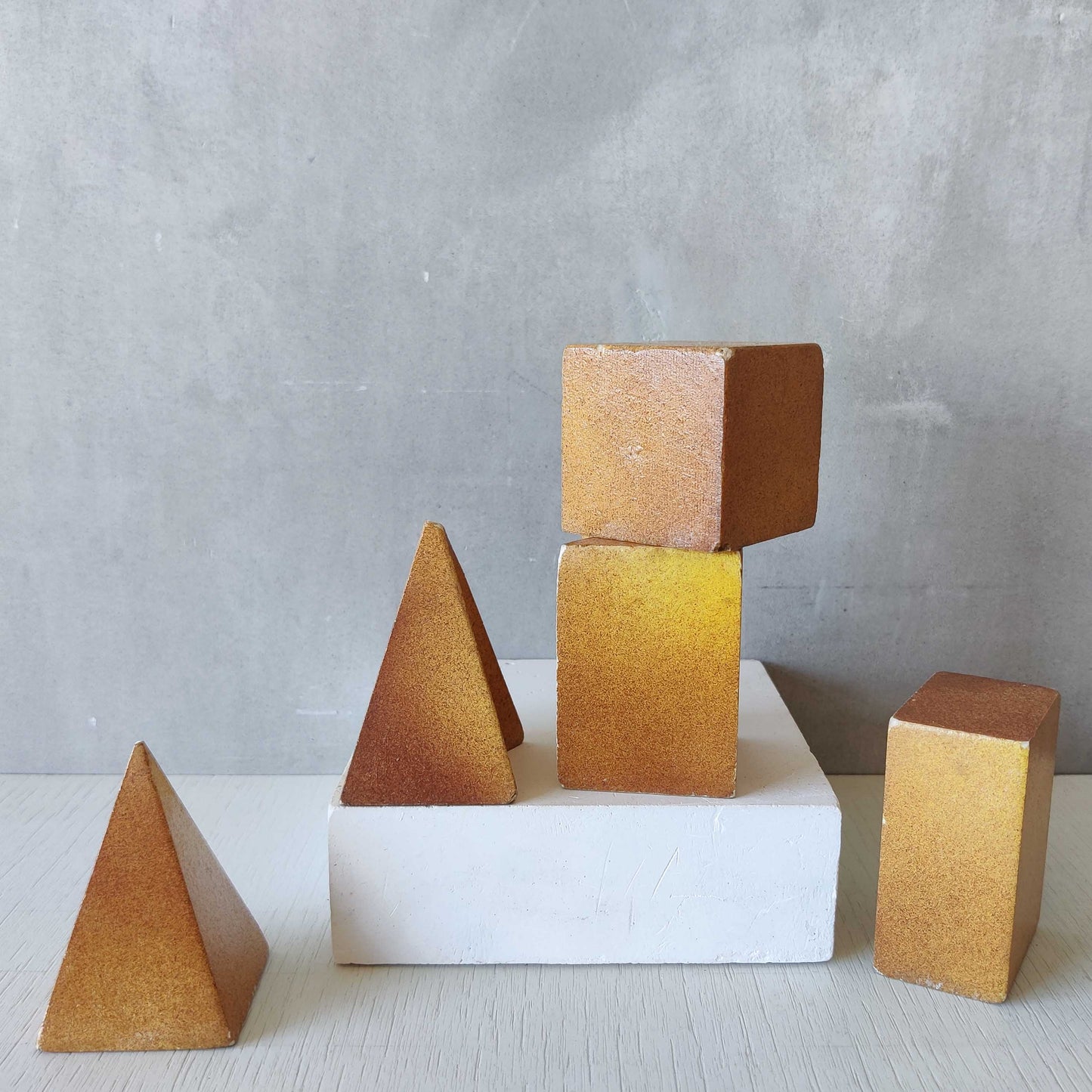 A set of 10 painted cast plaster 1950s geometric solids architectural models