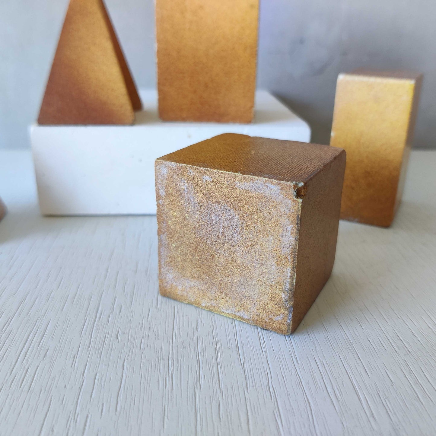 A set of 10 painted cast plaster 1950s geometric solids architectural models