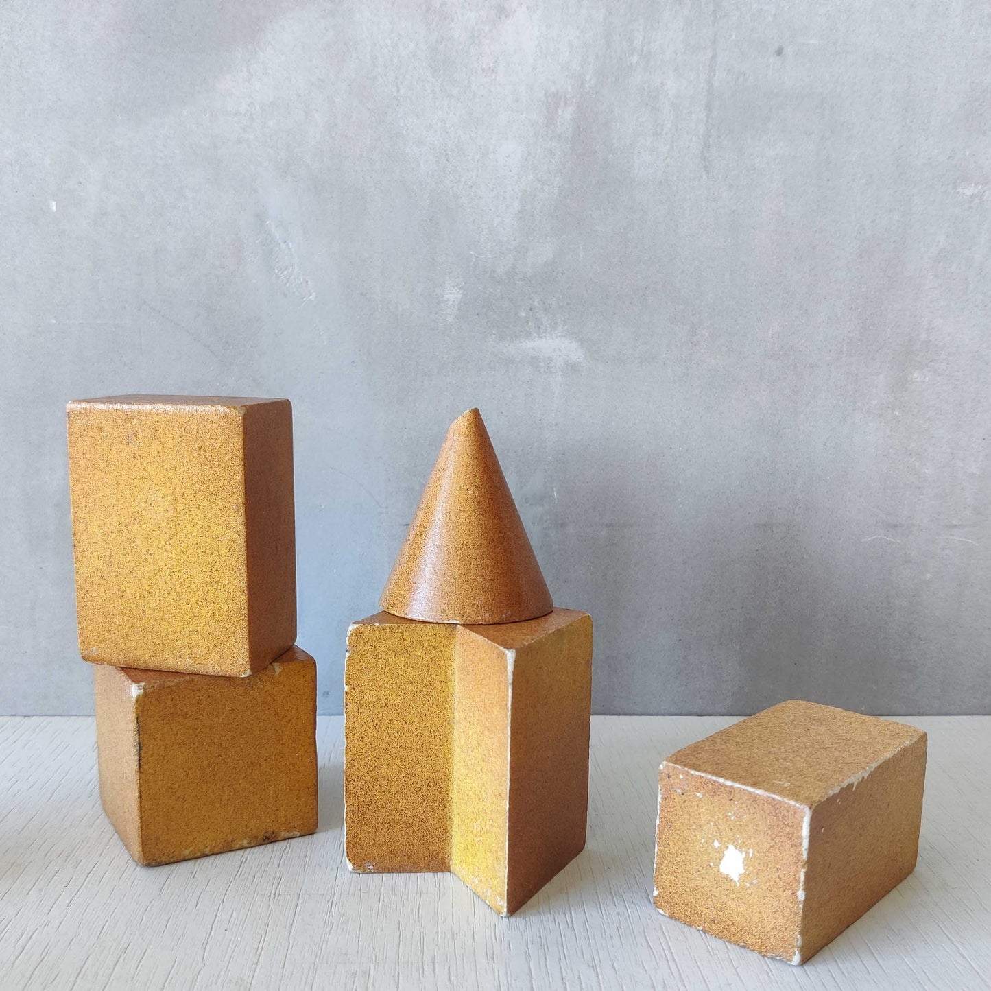 A set of 10 painted cast plaster 1950s geometric solids architectural models