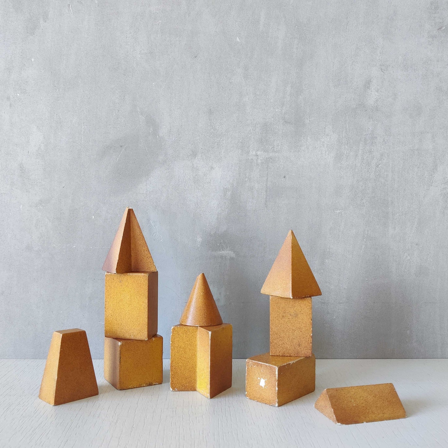 A set of 10 painted cast plaster 1950s geometric solids architectural models