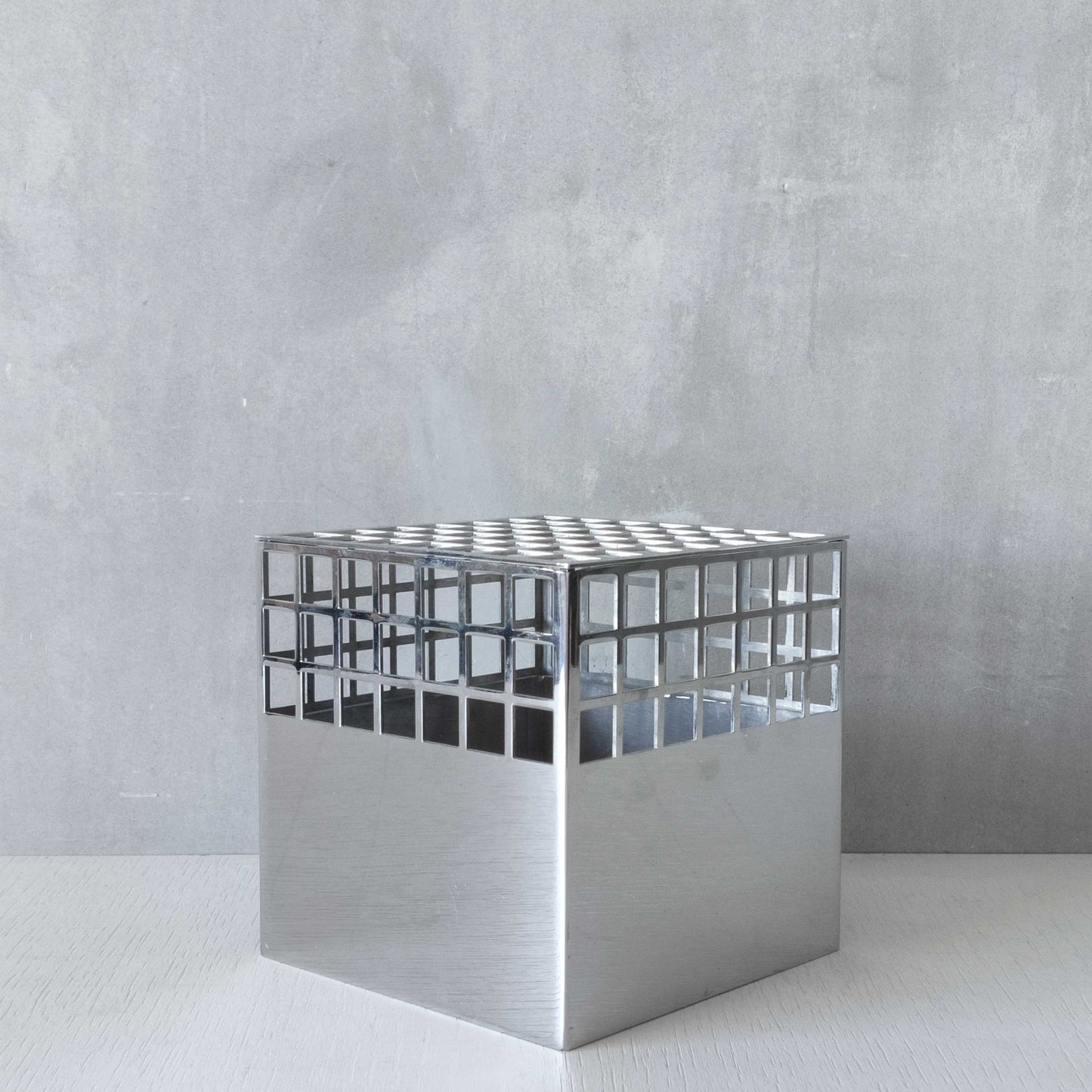 Georg Jensen Matrix stainless steel gridded cube vase designed by Monica Förster