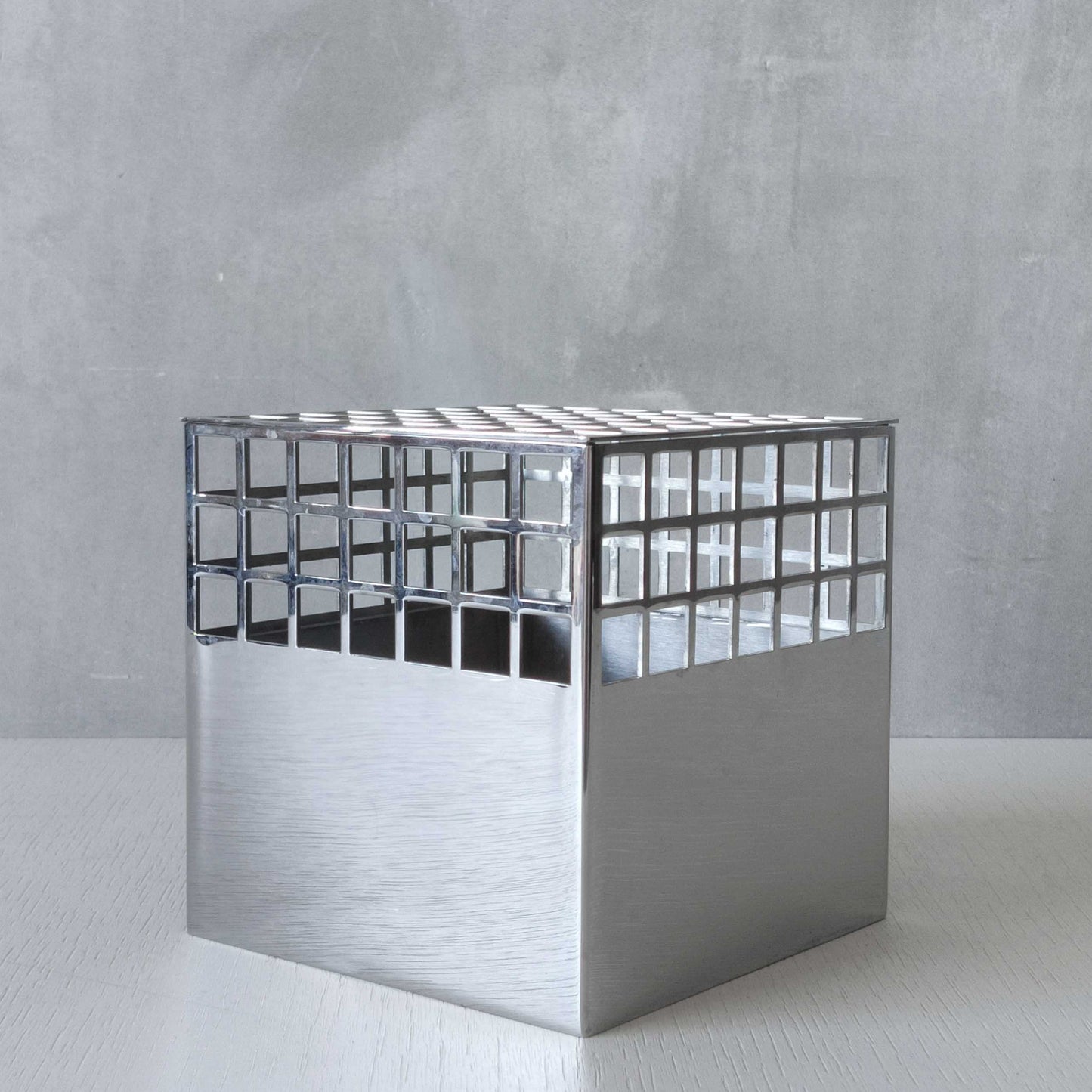 Georg Jensen Matrix stainless steel gridded cube vase designed by Monica Förster