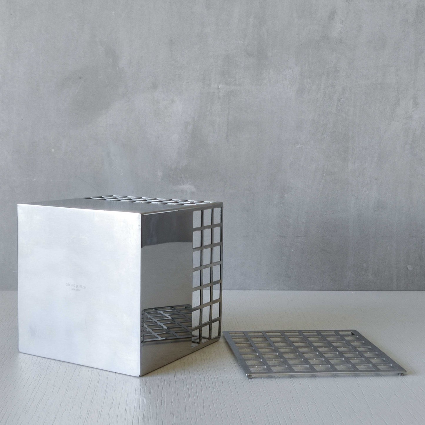 Georg Jensen Matrix stainless steel gridded cube vase designed by Monica Förster