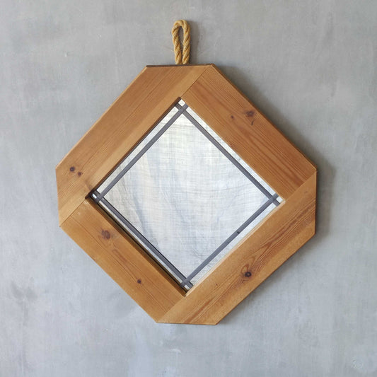A 1990s pine framed leaded mirror with rope loop