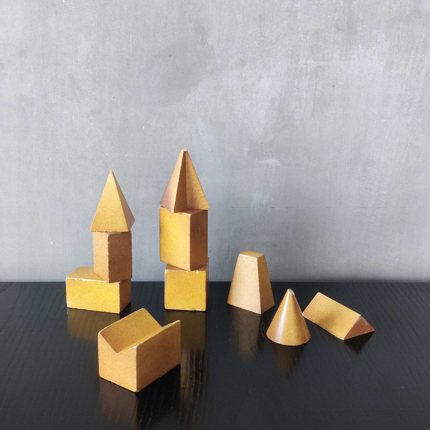 A set of 10 painted cast plaster 1950s geometric solids architectural models