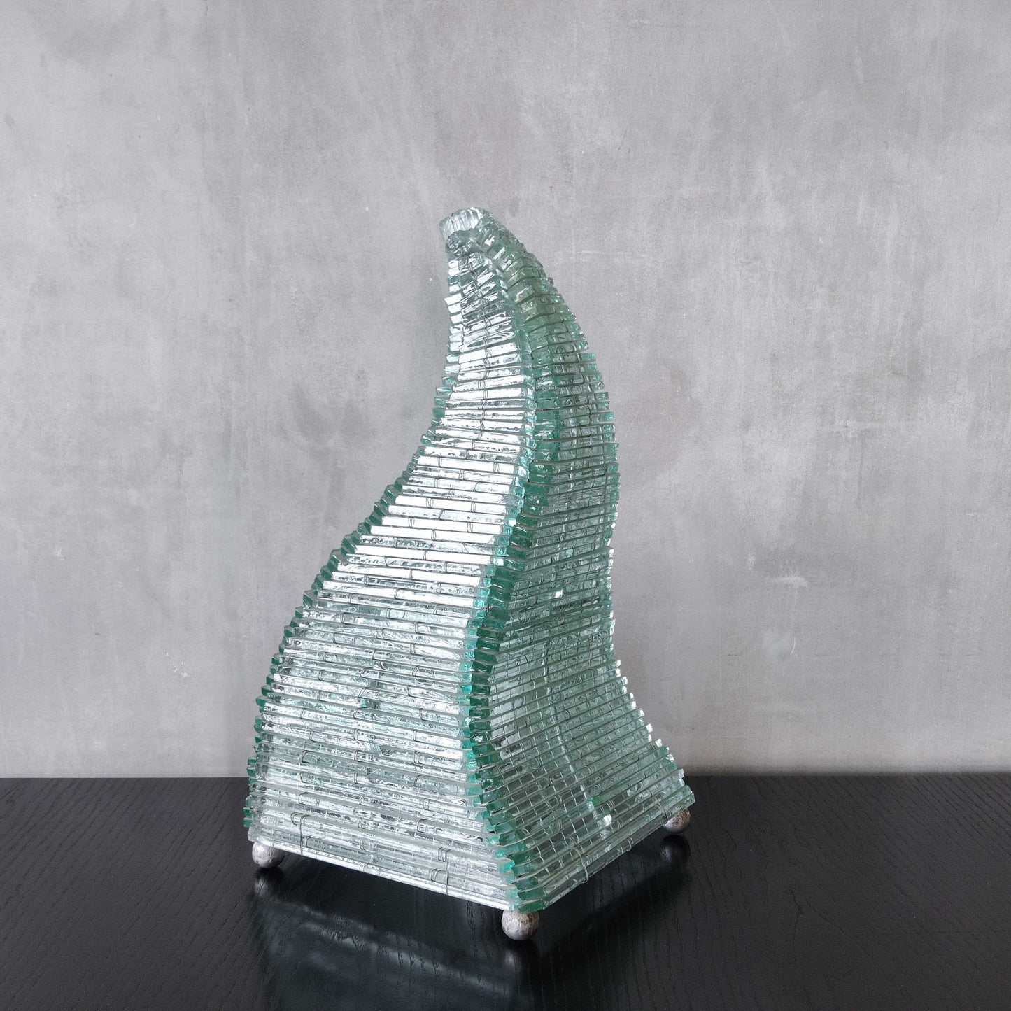 A 1970s stacked glass shard sculptural twisted pyramid lamp